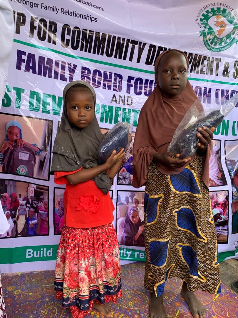 Girls receiving support items