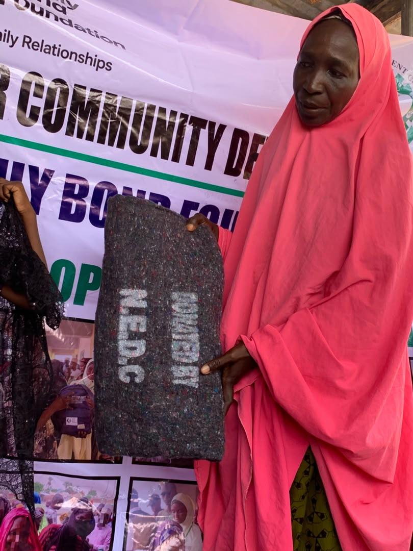Woman with NEDC blanket